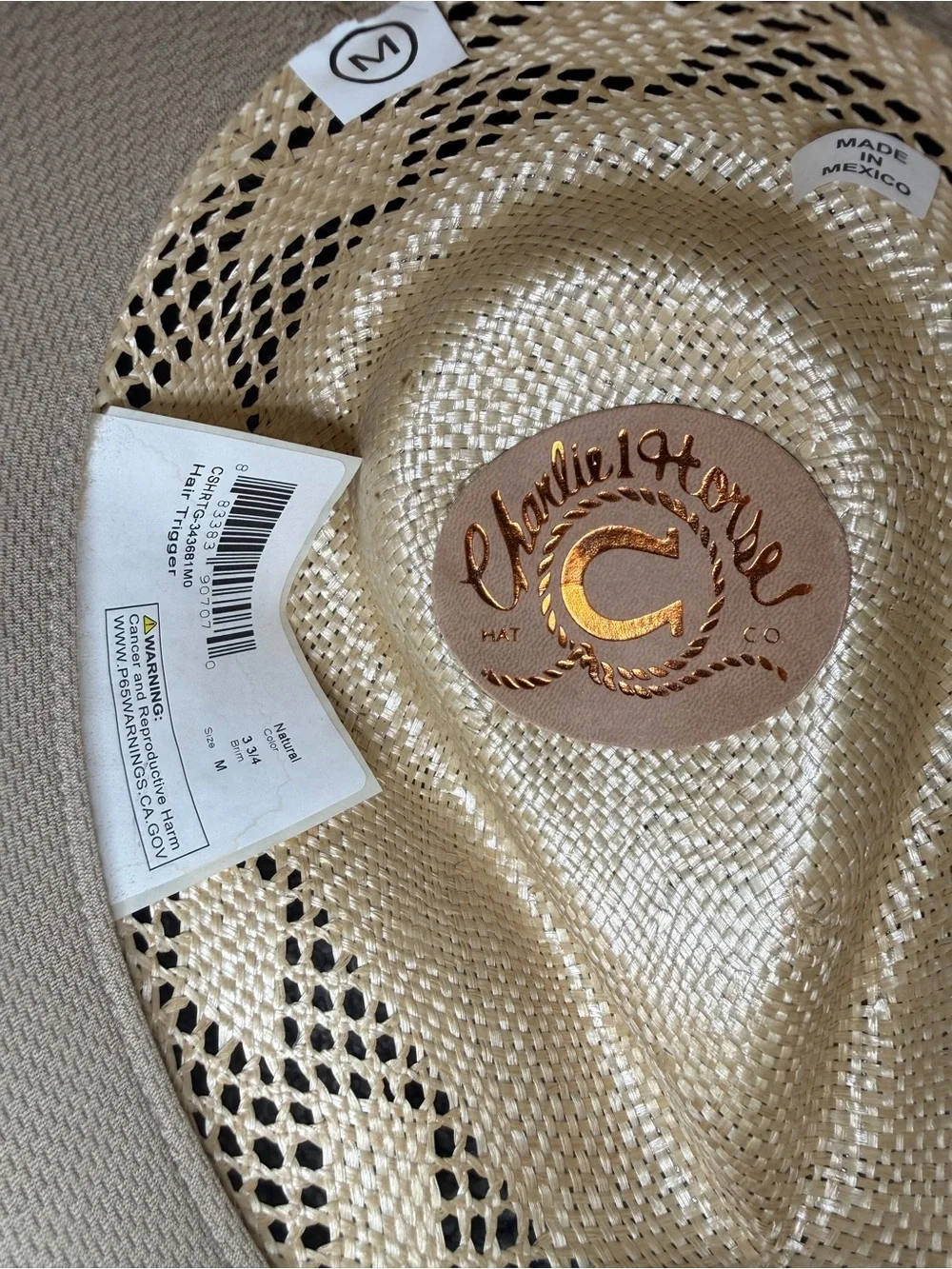 Women’s Western Charlie Horse straw hat with brown concho band